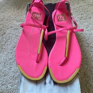 Gently worn hot pink sandal.